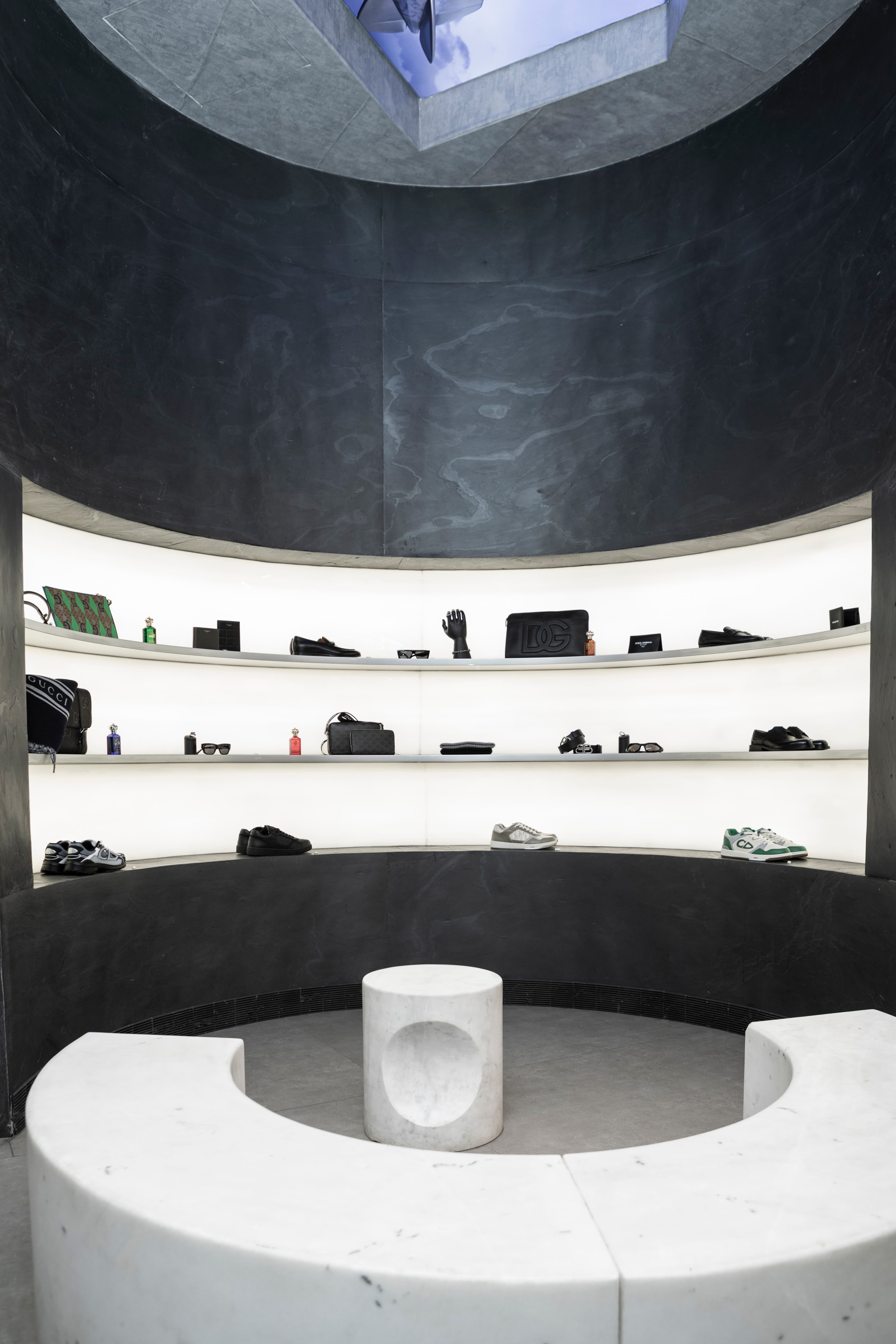 Minimalist curved wall with shoe shelves